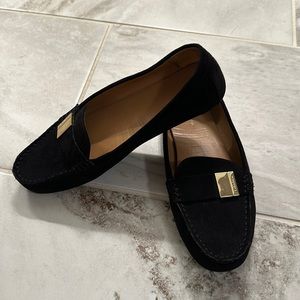 Calvin Klein Black and Gold Loafers